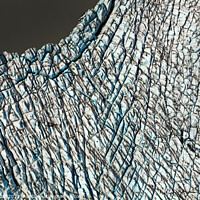 Buy canvas prints of Aerial view ice crevasses frozen glacier Alaska USA by Spotmatik 