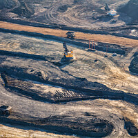 Buy canvas prints of Aerial Ft McMurray Industrial excavator surface pit mining  by Spotmatik 