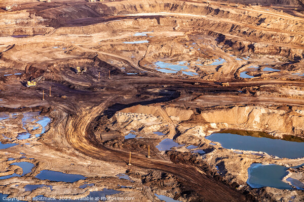 Aerial Alberta mining area large dump carrying Oilsand Picture Board by Spotmatik 