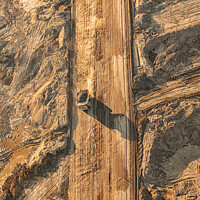 Buy canvas prints of Aerial view Oilsands mining area large dump trucks  by Spotmatik 