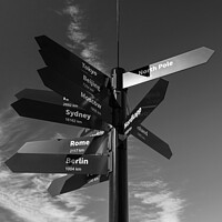 Buy canvas prints of Travel Mile signpost places of the world to explore by Spotmatik 