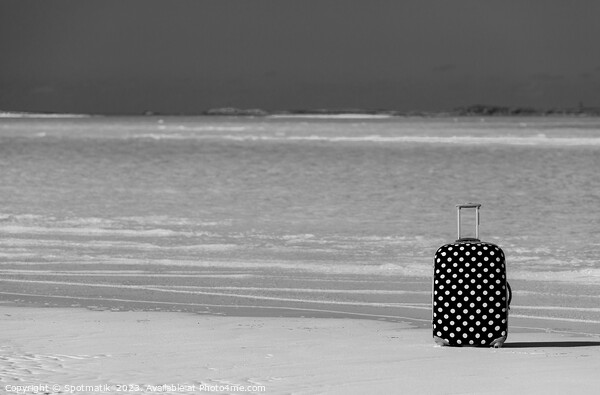 Red polka dot travel suitcase on sand beach Picture Board by Spotmatik 