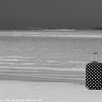 Buy canvas prints of Red polka dot travel suitcase on sand beach by Spotmatik 