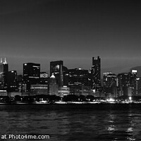 Buy canvas prints of Panorama of Chicago city skyscrapers illuminated at dusk by Spotmatik 