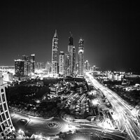 Buy canvas prints of Night illuminated view Skyscrapers Sheikh Zayed road Dubai  by Spotmatik 