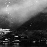 Buy canvas prints of Sunlight beaming through light mist Norwegian glacial fjord  by Spotmatik 