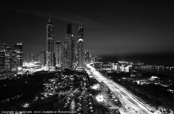 Dubai dusk illuminated view Sheikh Zayed city skyscrapers  Picture Board by Spotmatik 