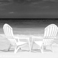 Buy canvas prints of Panoramic white chairs on beach beside ocean by Spotmatik 