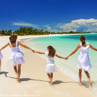 Buy canvas prints of Happy Caucasian family in white walking holding hands  by Spotmatik 