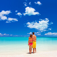 Buy canvas prints of Happy Caucasian couple together on beach holiday Caribbean by Spotmatik 