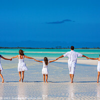 Buy canvas prints of Healthy Caucasian family together on beach vacation Bahamas by Spotmatik 