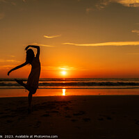 Buy canvas prints of Happy young girl dancing on beach at sunset by Spotmatik 