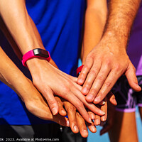 Buy canvas prints of Multi ethnic friends joining hands after beach workout by Spotmatik 
