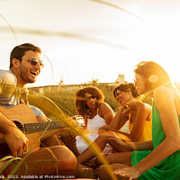 Buy canvas prints of Young friends enjoying guitar music on beach vacation by Spotmatik 