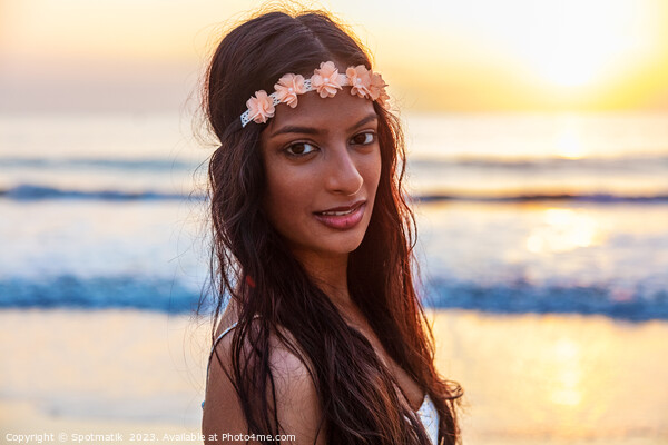 Young Indian woman by ocean on Summer vacation Picture Board by Spotmatik 