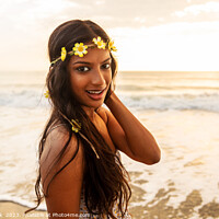 Buy canvas prints of Indian woman by the ocean wearing flower headband by Spotmatik 