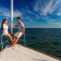 Buy canvas prints of Hispanic couple enjoying luxury travel on private yacht by Spotmatik 