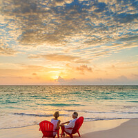 Buy canvas prints of Retired Caucasian couple on beach at sunset Bahamas by Spotmatik 