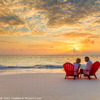 Buy canvas prints of Mature couple enjoying ocean sunset on beach Bahamas by Spotmatik 