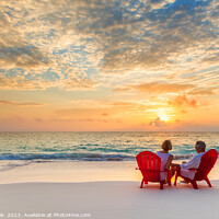 Buy canvas prints of Retired couple enjoying tropical sunrise over ocean Bahamas by Spotmatik 