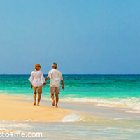 Buy canvas prints of Panoramic view mature couple walking on beach Bahamas by Spotmatik 