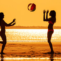 Buy canvas prints of Panoramic silhouette friends with beach ball at sunset by Spotmatik 