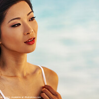 Buy canvas prints of Close up of beautiful Asian girl on vacation by Spotmatik 