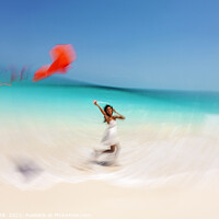 Buy canvas prints of Motion blurred young woman flying kite on beach by Spotmatik 
