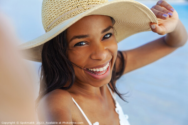 Portrait of smiling African American girl wearing hat Picture Board by Spotmatik 