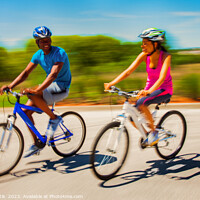Buy canvas prints of African American couple keeping fit riding bikes together by Spotmatik 