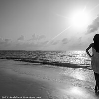 Buy canvas prints of Asian female enjoying freedom outdoors by the ocean by Spotmatik 