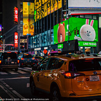 Buy canvas prints of Times Square At Night  by Benjamin Brewty