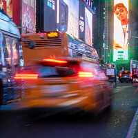 Buy canvas prints of Yellow Taxi long Exposure by Benjamin Brewty
