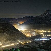 Buy canvas prints of Village between the mountains at night by Balázs Tóth