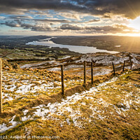 Buy canvas prints of Wansfell Pike sunset with Windermere in the background by Julian Carnell