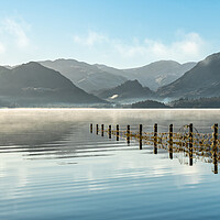 Buy canvas prints of Misty Derwent water with Borrowdale in the Distance by Julian Carnell