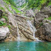 Buy canvas prints of Small waterfall with the water flowing through the rock in a natural pool with turquoise color by Cristi Croitoru