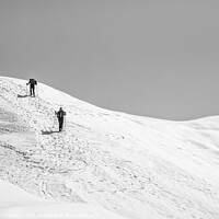 Buy canvas prints of Two Hikers on a trail walking through snow. Winter landscape in Carapathian Mountains, Romania. by Cristi Croitoru