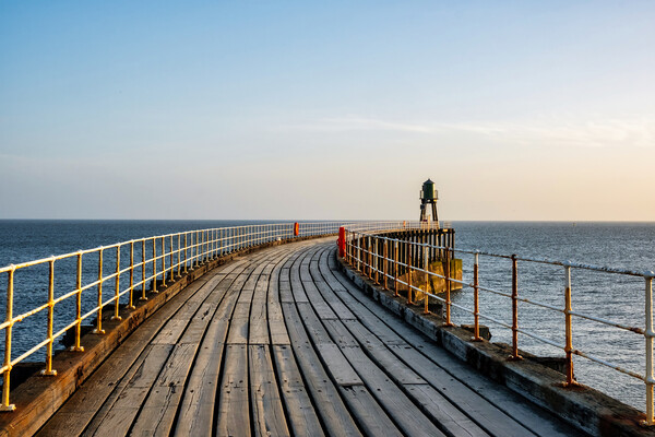 Sunrise over Whitby Pier Picture Board by Steve Smith