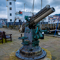 Buy canvas prints of Scarborough Lighthouse And Gun by Steve Smith