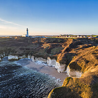 Buy canvas prints of Majestic Sunrise over Flamborough Head Lighthouse by Tim Hill