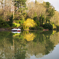Buy canvas prints of Peaceful reflections on Scarboroughs Boating Lake by Tim Hill