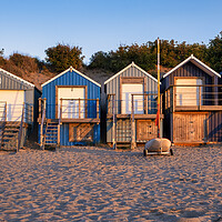 Buy canvas prints of Golden Sunrise Over Abersoch Beach Huts by Tim Hill