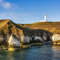 Buy canvas prints of Flamborough sea stack and Lighthouse by Tim Hill
