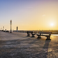 Buy canvas prints of Sunrise over Whitby Pier, North Yorkshire by Tim Hill
