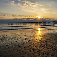 Buy canvas prints of Sun star over Saltburn Pier by Tim Hill