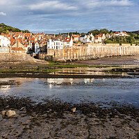 Buy canvas prints of Spring sunshine at Robin Hoods Bay by Tim Hill
