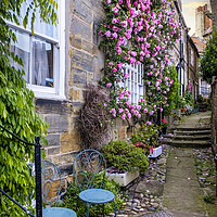 Buy canvas prints of A Romantic Haven in Robin Hoods Bay by Tim Hill