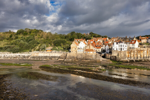 Moody skies over Robin Hoods Bay Picture Board by Tim Hill