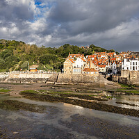 Buy canvas prints of Moody skies over Robin Hoods Bay by Tim Hill